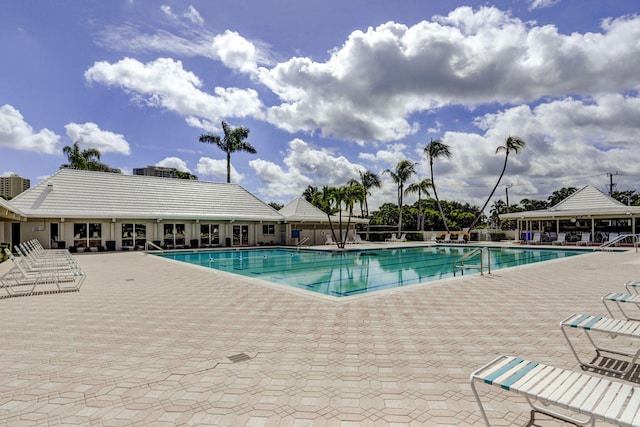 view of swimming pool featuring a patio