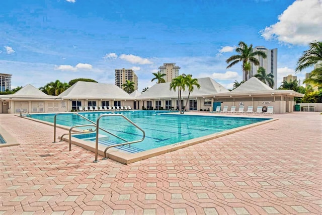 view of swimming pool featuring a patio