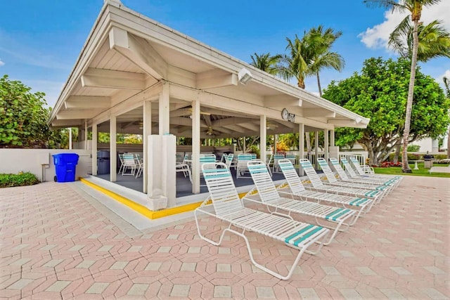 view of patio featuring ceiling fan