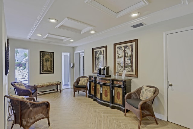 living area with crown molding and light parquet floors