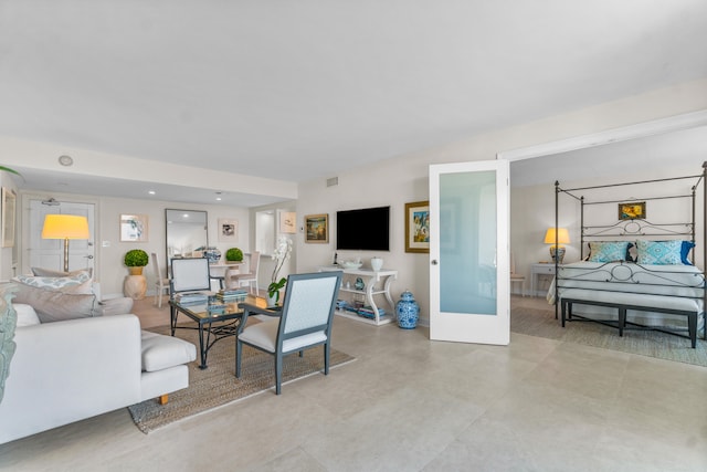 tiled living room with french doors