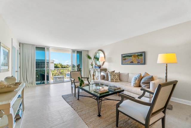 tiled living room with floor to ceiling windows