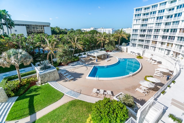 view of swimming pool with a patio