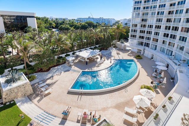 view of swimming pool with a patio area