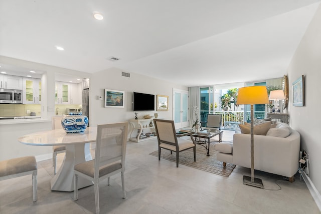 interior space featuring light tile floors