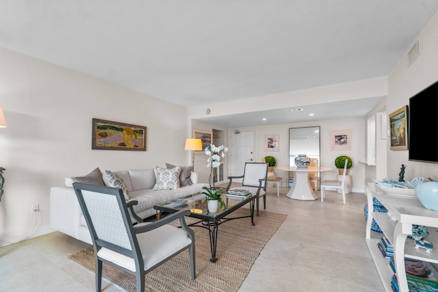 living room with light tile floors