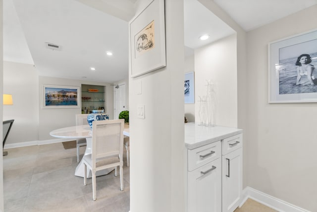 interior space featuring tile floors