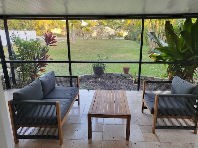 sunroom / solarium featuring wooden ceiling