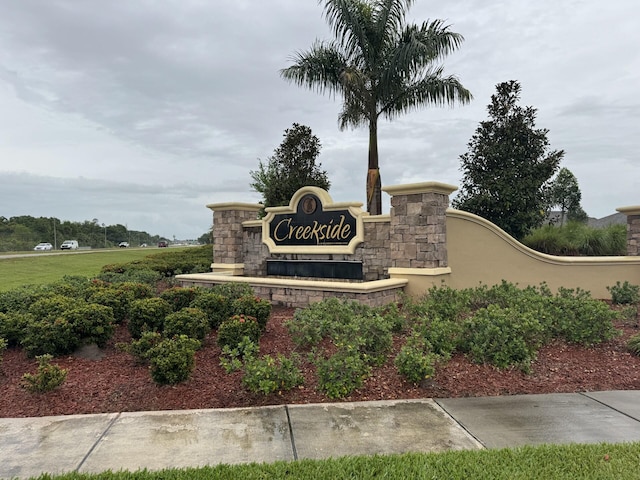 view of community sign