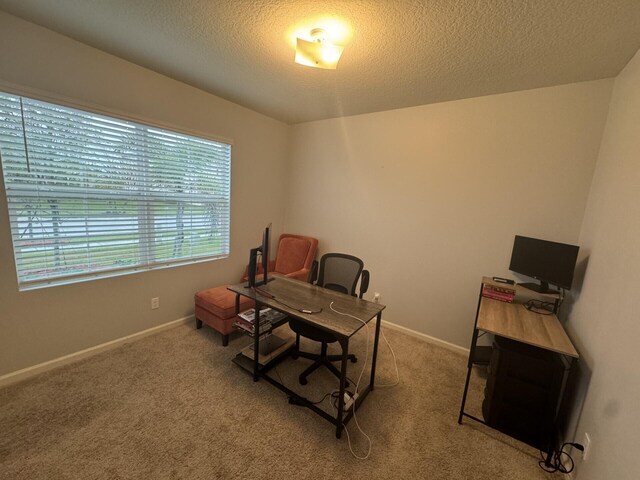 interior space featuring a textured ceiling