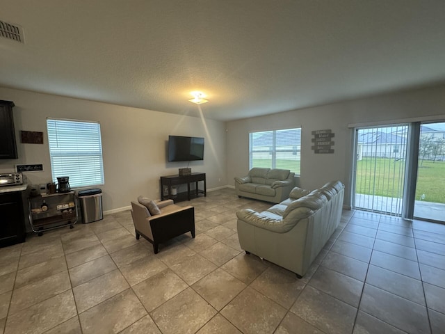 living room with light tile floors