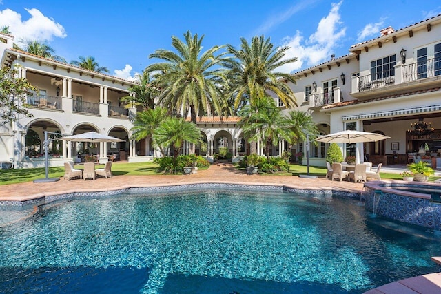 view of pool featuring a patio area