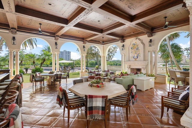 view of patio / terrace featuring exterior fireplace