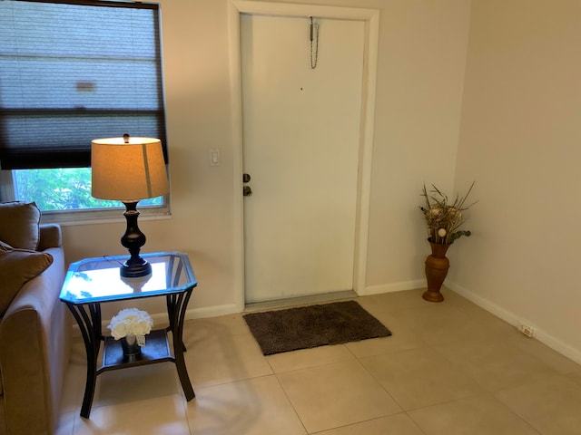 entrance foyer with light tile flooring