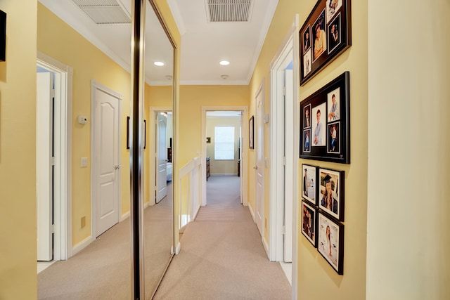 corridor with light carpet and ornamental molding