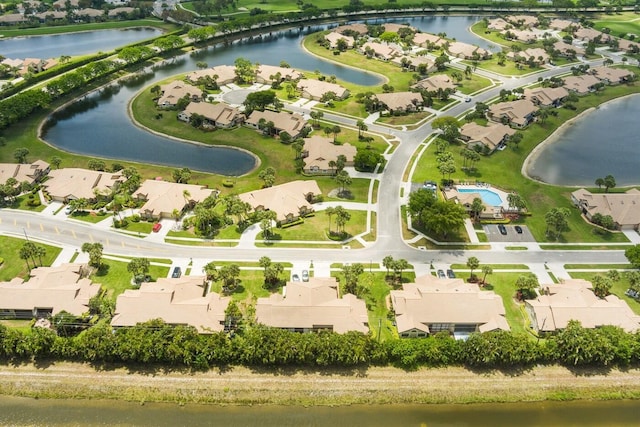 drone / aerial view with a water view