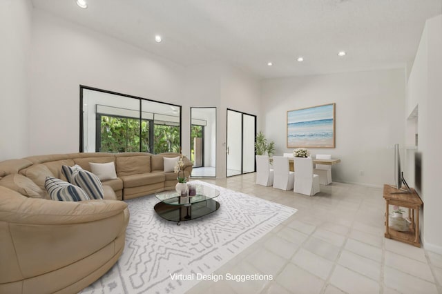 living room featuring high vaulted ceiling and light tile floors