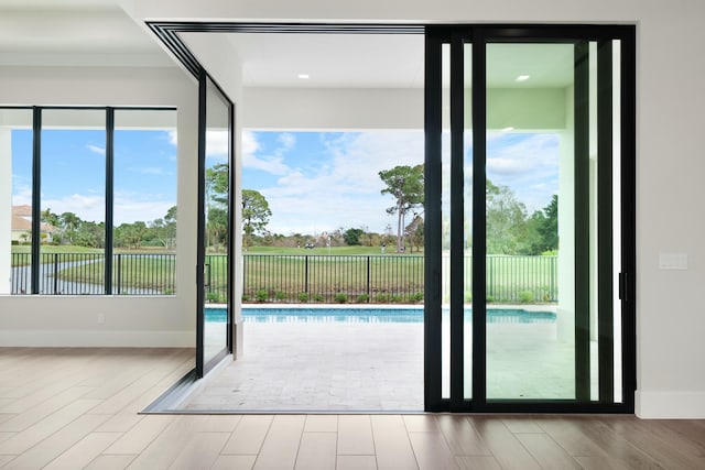 doorway to outside featuring light hardwood / wood-style floors