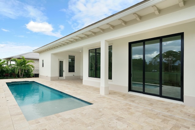 view of pool featuring a patio area