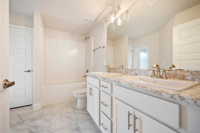 full bathroom featuring tile floors, tub / shower combination, dual vanity, and toilet