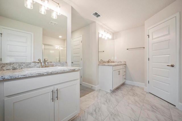 bathroom featuring tile floors and large vanity