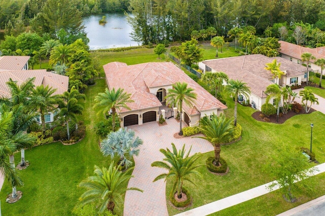 bird's eye view with a water view