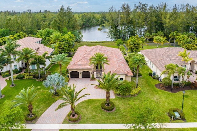 birds eye view of property featuring a water view