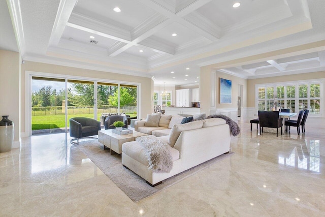 tiled living room with coffered ceiling, a wealth of natural light, ornamental molding, and beamed ceiling