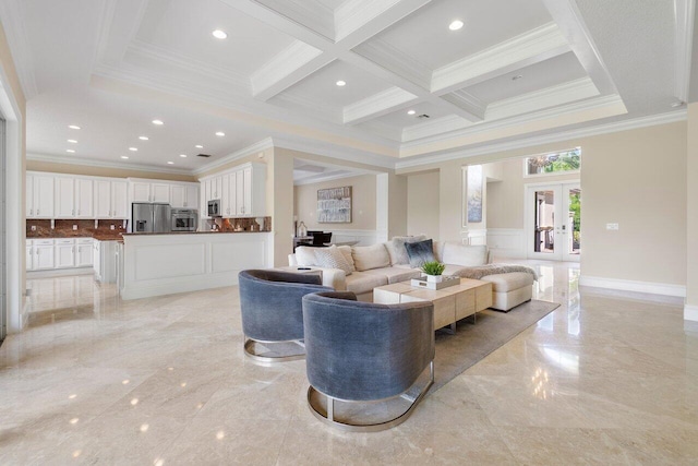 living room with coffered ceiling, ornamental molding, light tile floors, and french doors