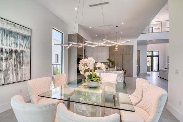 dining space featuring an inviting chandelier