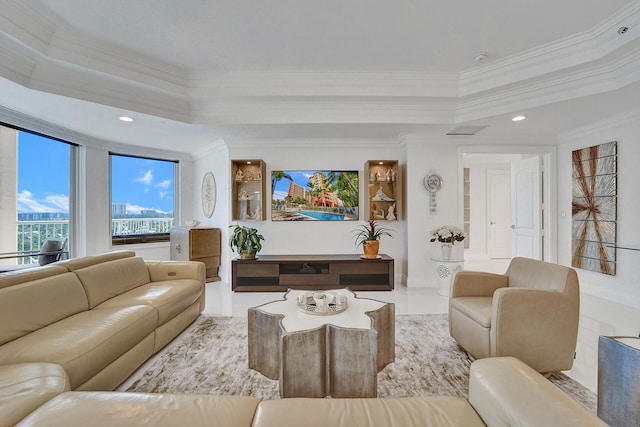 living room with ornamental molding and light tile patterned floors