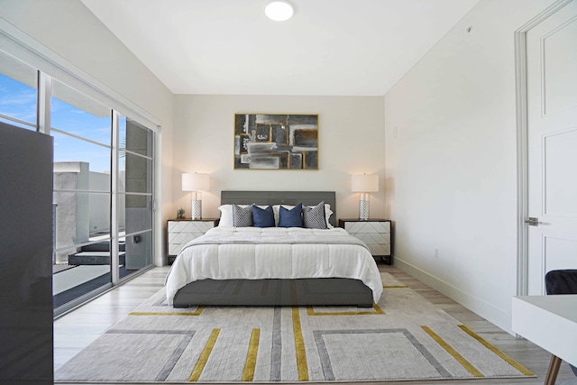 bedroom with light hardwood / wood-style floors