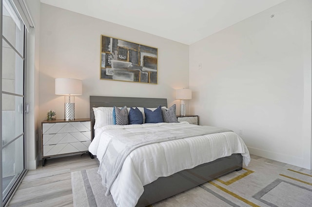 bedroom featuring light wood-type flooring