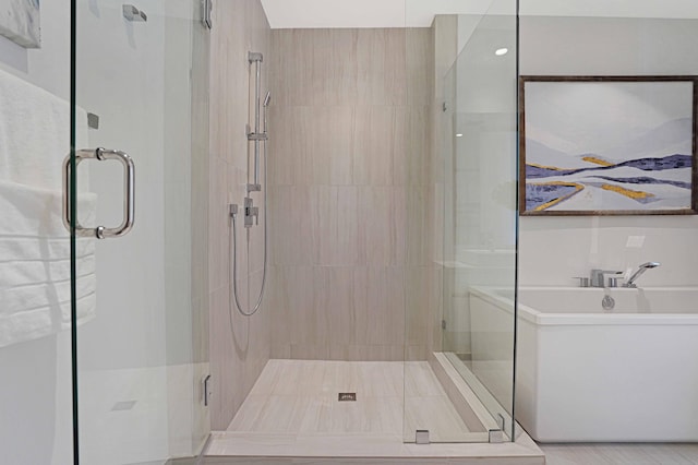 bathroom featuring an enclosed shower