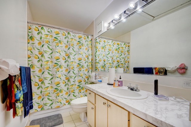 bathroom with toilet, tile flooring, and vanity