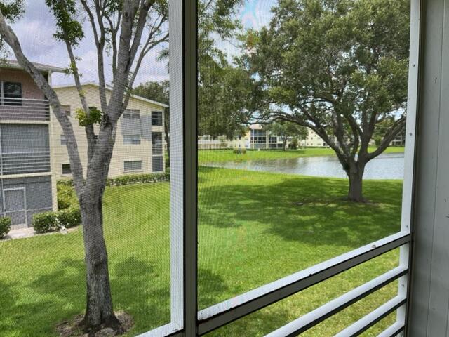 entryway featuring a water view