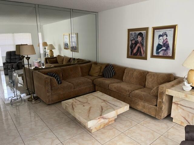 living room with light tile flooring