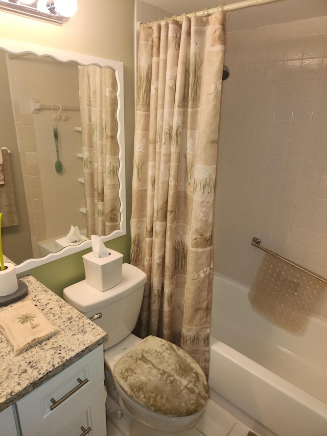 full bathroom featuring tile patterned flooring, toilet, shower / tub combo with curtain, and vanity