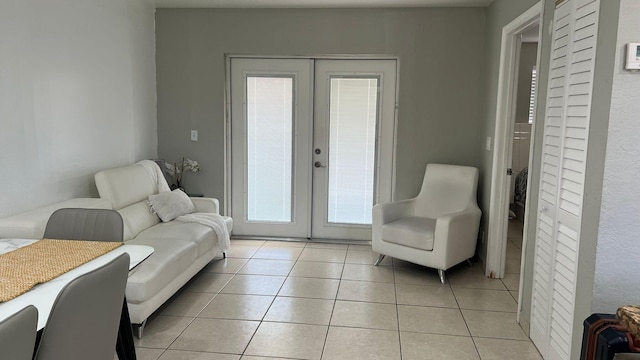 tiled living room with french doors