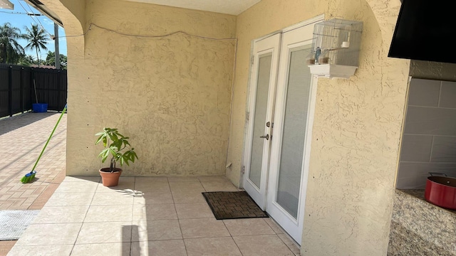 doorway to property with french doors and a patio