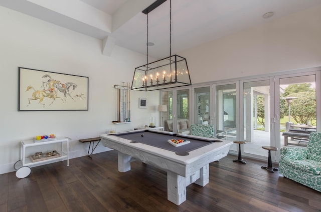 playroom featuring billiards, dark wood-type flooring, and a towering ceiling