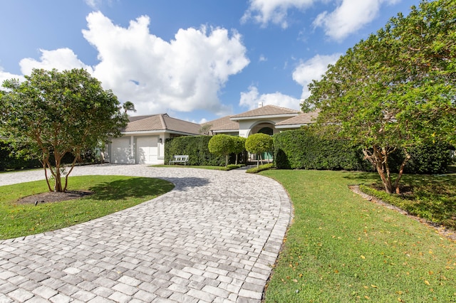 view of front of property with a front lawn