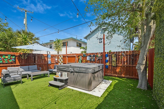 view of yard featuring an outdoor hangout area and a hot tub