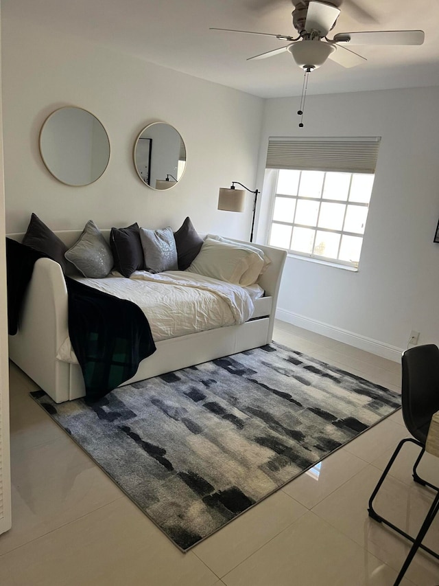 bedroom featuring light tile patterned floors and ceiling fan