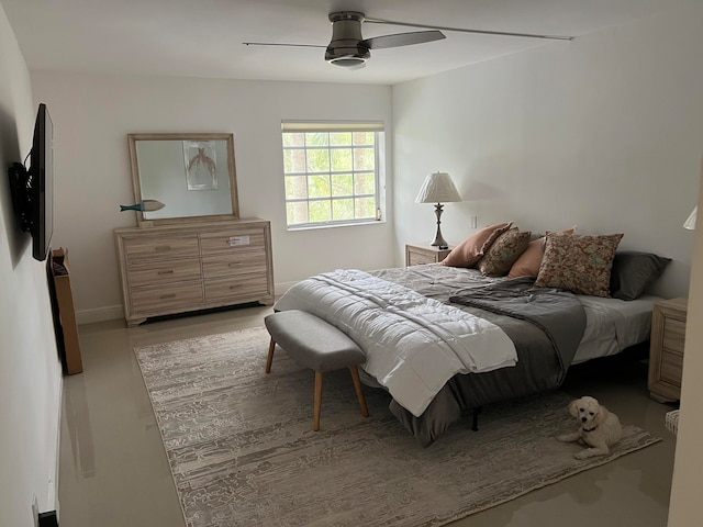 bedroom featuring light hardwood / wood-style flooring and ceiling fan