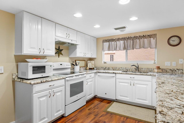 kitchen featuring white appliances, white cabinets, dark hardwood / wood-style flooring, and sink