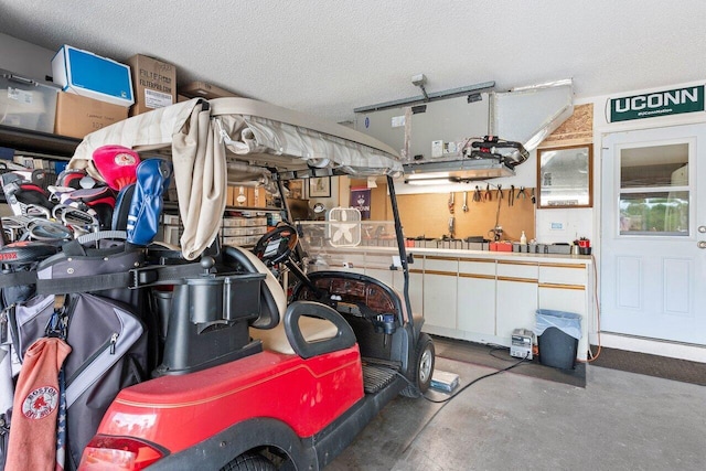 garage with a workshop area