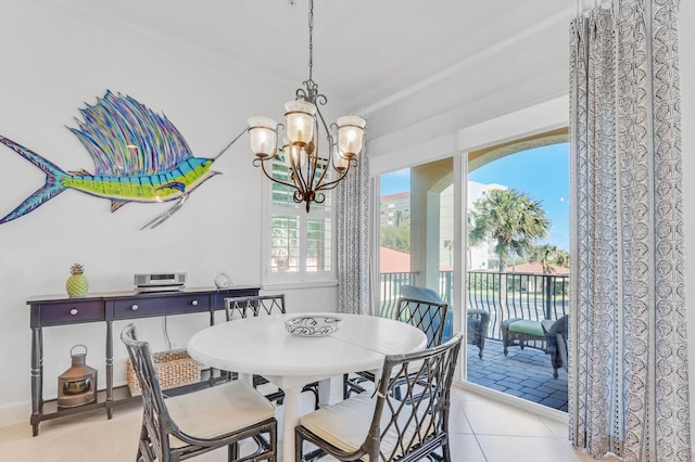 dining space with a chandelier and light tile patterned flooring