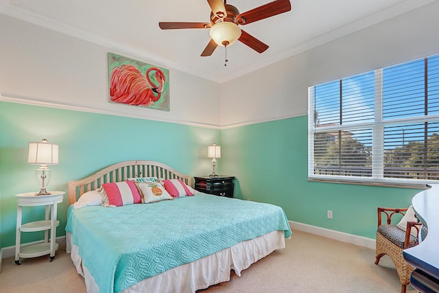 bedroom featuring ceiling fan, crown molding, and light carpet