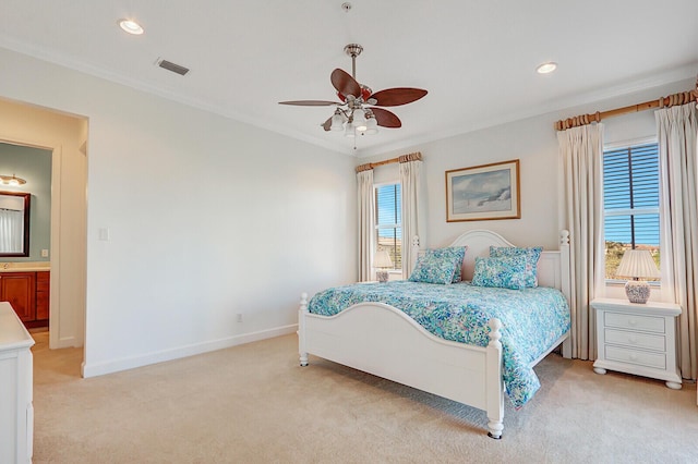 bedroom with ceiling fan, light carpet, and ornamental molding